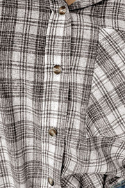 Plaid hooded shirt jacket in cotton with button front and drawstrings.