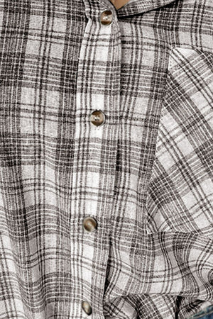 Plaid hooded shirt jacket in cotton with button front and drawstrings.