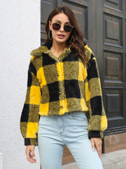 Textured plaid teddy crop jacket in black and gold with button front and collar.