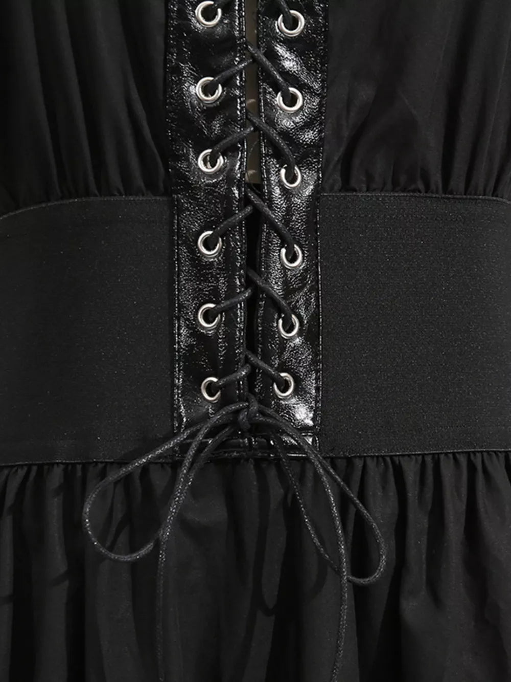 Black lace-up midi dress with faux leather detail and elastic waistband.