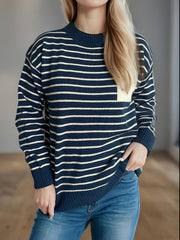 Dark Blue striped knit sweater with asymmetrical pocket detail.