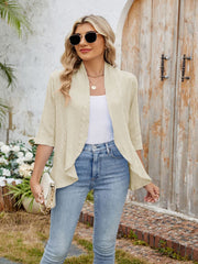 Tan eyelet cascade cardigan with open front and 3/4 sleeves