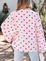Maternity blouse with pink stripes and red hearts, flounce sleeves, button front.