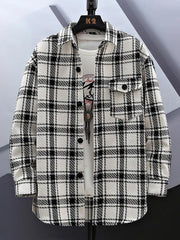 Oversized flannel button-up shirt in white grid pattern with two chest pockets.