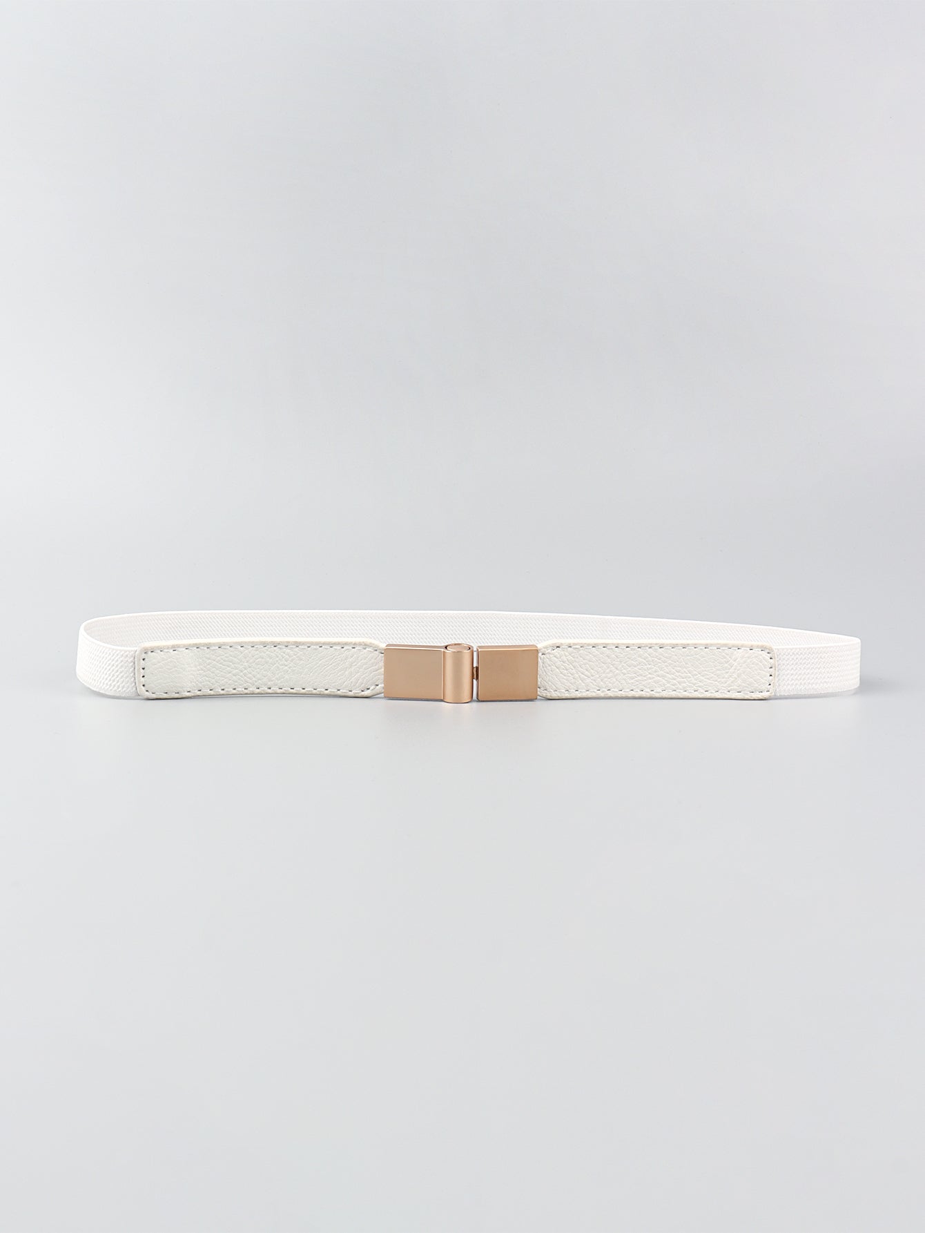 White elasticated buckle belt with leather detail and rose gold buckle