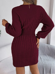 Wine cable knit mini dress with long sleeves and cinched waist