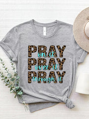 Gray graphic tee with leopard print text that reads "PRAY on it PRAY over it PRAY through it