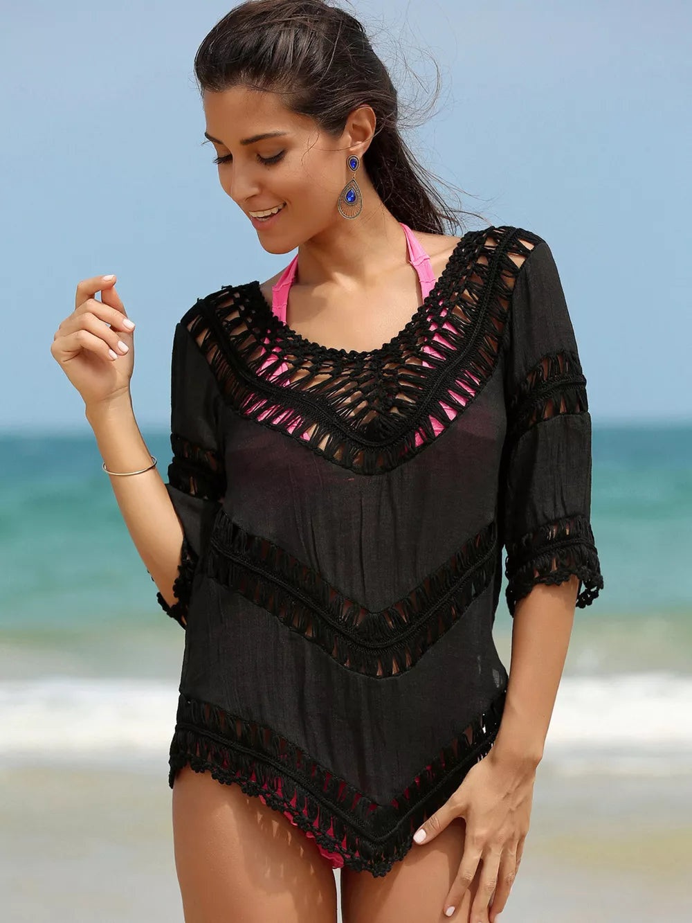 Black chevron crochet V-neck cover-up with cutout details and fringe trim.