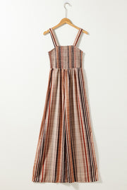 Striped square neck wide-leg romper with smocked bodice and adjustable straps.