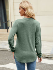 Sage crew neck t-shirt with long sleeves and vertical seam detail.