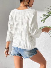 White textured knit dolman sleeve sweater with 3/4 sleeves and a relaxed fit.