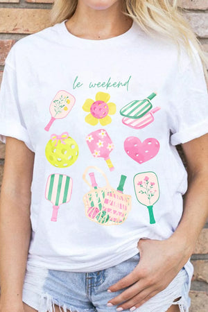 White polyester t-shirt with playful pickleball and flower graphic print.