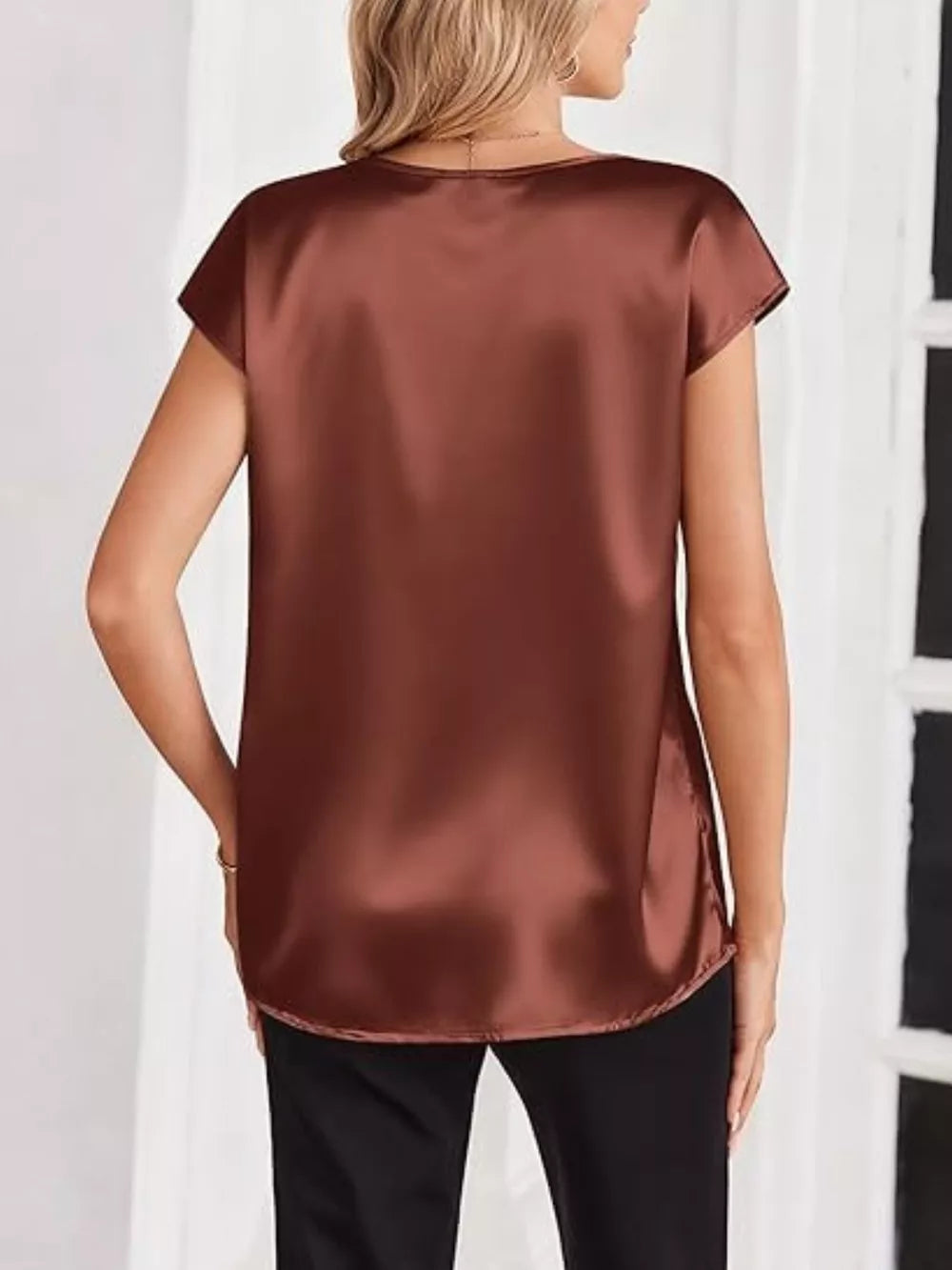 Brown satin V-neck maternity shirt with short sleeves.