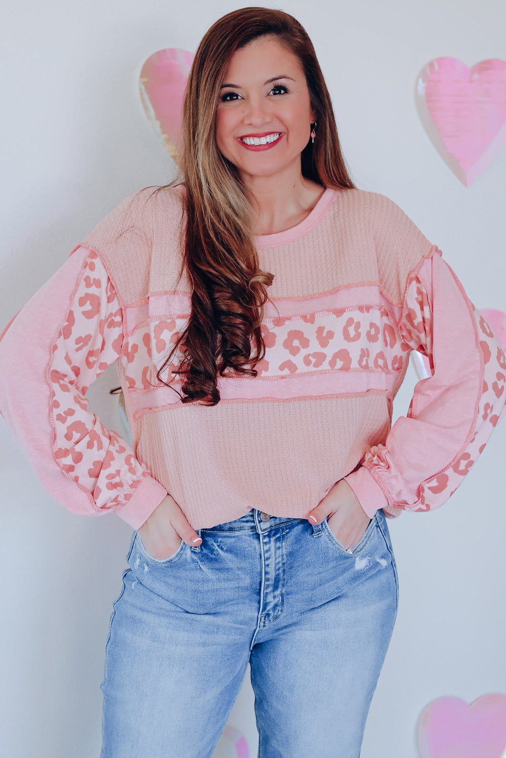 Blush pink waffle knit top with leopard print panels and contrast stitching