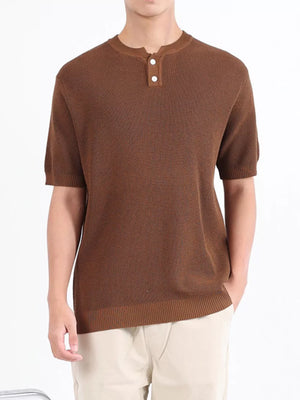 Brown textured knit henley shirt with short sleeves and two white buttons.
