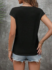 Black cap sleeve slouchy v-neck tee with a casual fit, styled with denim shorts.