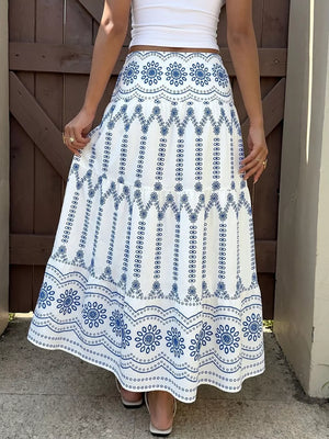 Bohemian maxi skirt with blue floral embroidery and tiered hem
