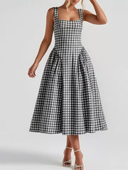 Black plaid square neck midi dress with a-line skirt and gathered waist detail.