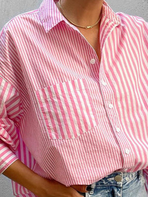Pink and white striped oversized button-down shirt with a chest pocket and collar.