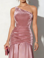 Dusty pink velvet one-shoulder maxi dress with ruched detail and satin skirt.