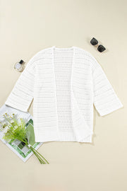 White open-knit dolman sleeve cardigan with breathable acrylic fabric and a casual boho style.