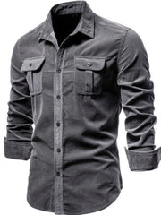 Dark Gray corduroy utility shirt with two button flap chest pockets and button front.