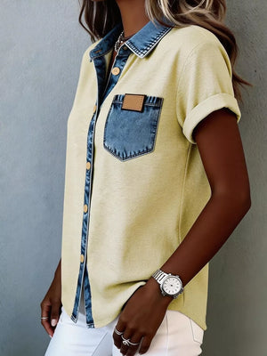 Yellow heathered short sleeve maternity shirt with denim collar, pocket, and button placket.