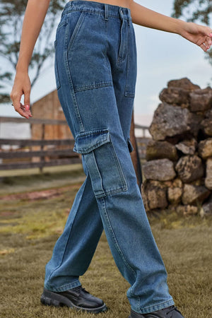 Medium wash denim cargo pants with multiple utility pockets and a straight leg cut.