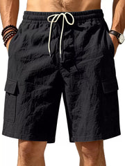 Black cargo shorts with drawstring waist and crinkled texture.