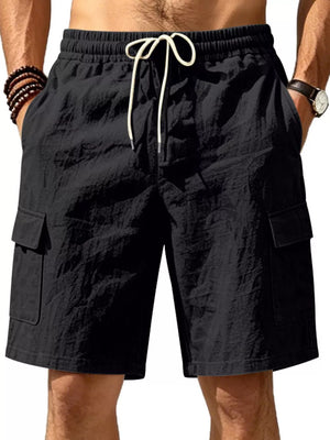 Black cargo shorts with drawstring waist and crinkled texture.