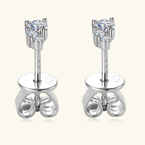 Silver celestial cluster diamond stud earrings with butterfly backs.