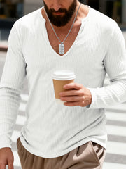 White ribbed long sleeve t-shirt with deep V-neck and a man holding a coffee cup.