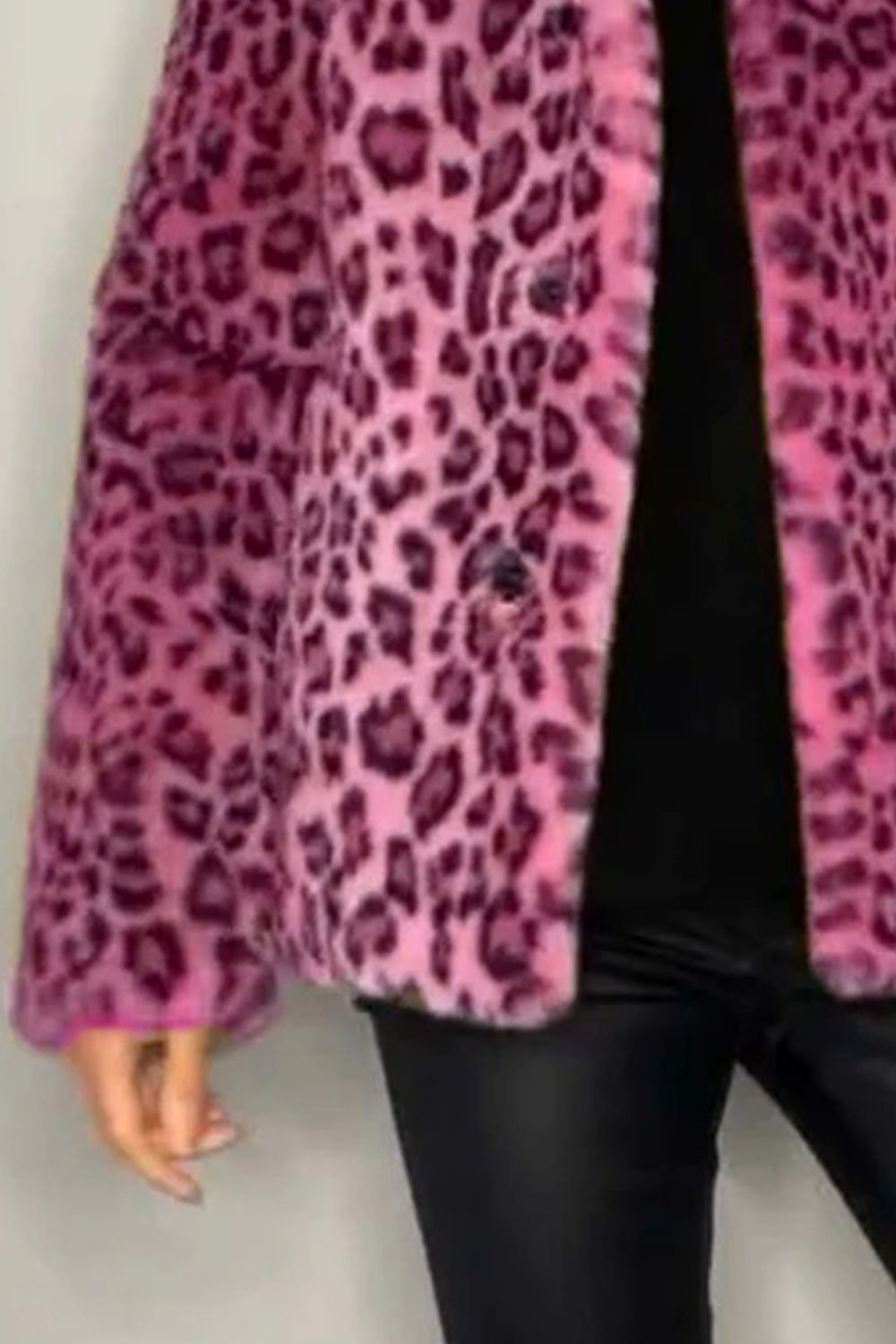 Leopard faux fur collar coat in pink with black animal print, featuring a button front and lapel.