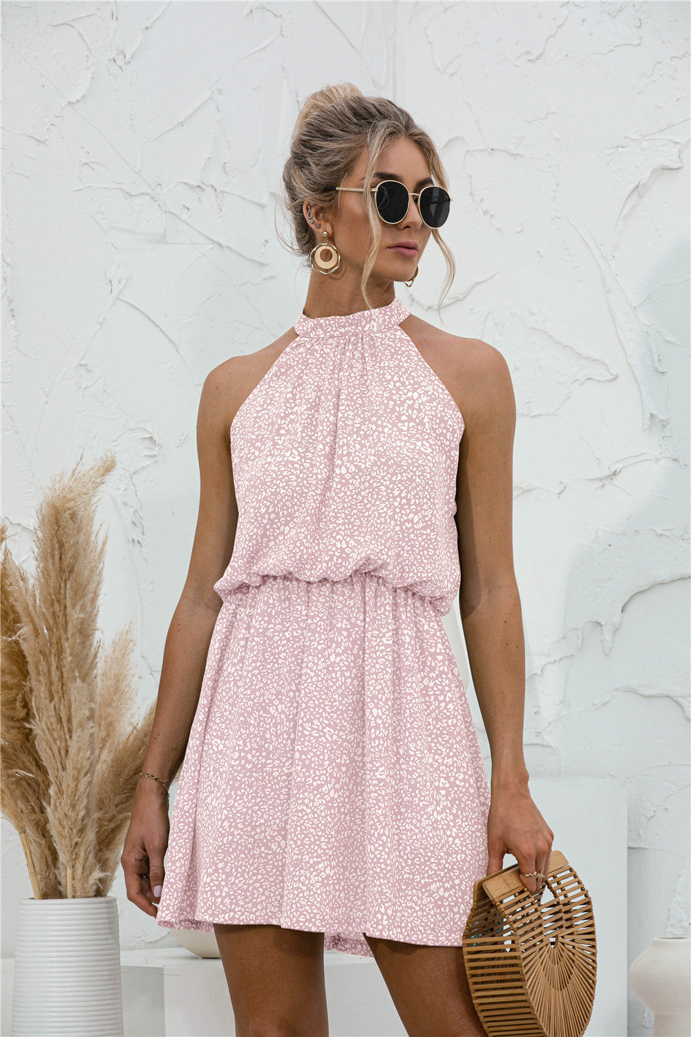 Blush pink floral halter neck mini dress with elastic waist
