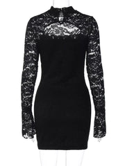 Black lace cutout mini dress with long sleeves and mock neck.