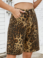 Leopard print denim bermuda shorts with a comfortable, casual fit.