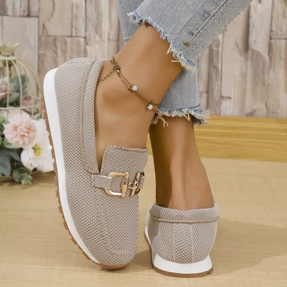 Chic khaki mesh slip-on loafers with gold buckle detail and white sole.