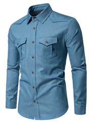 Light blue cotton denim shirt with two chest pockets and button-down front.