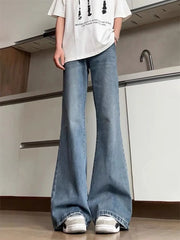 Men's light wash denim flare leg jeans with distressed details.