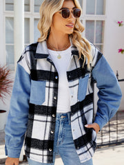 Colorblock plaid denim shacket in dusty blue with button front and chest pockets.