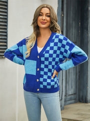Checkerboard block knit cardigan in blue with V-neck and buttons.