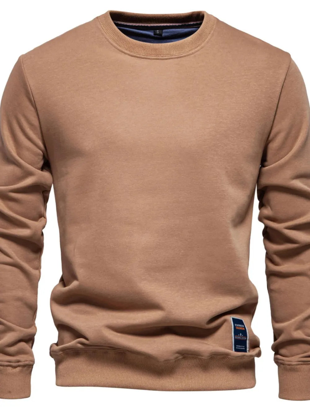 Camel crewneck sweatshirt with subtle patch detail on the hem