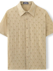 Khaki geometric eyelet short sleeve resort shirt with button front and collar.