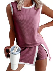 Ribbed knit sleeveless top and skort set in Purple Red with white trim.