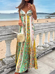 Botanical print sweetheart maxi dress with green, yellow, and pink panels.