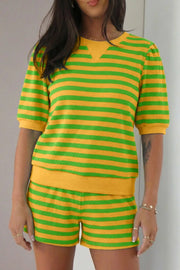 Puff sleeve top and drawstring shorts set in green and yellow horizontal stripes.