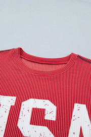 Red twisted rib t-shirt with distressed USA graphic and crew neck.