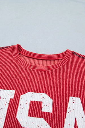 Red twisted rib t-shirt with distressed USA graphic and crew neck.