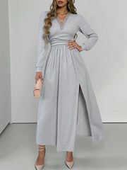Light gray lace detail V-neck maxi dress with long sleeves and a high slit.