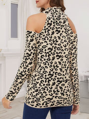 Leopard print cold shoulder knit sweater in tan with a mock neck and long sleeves.